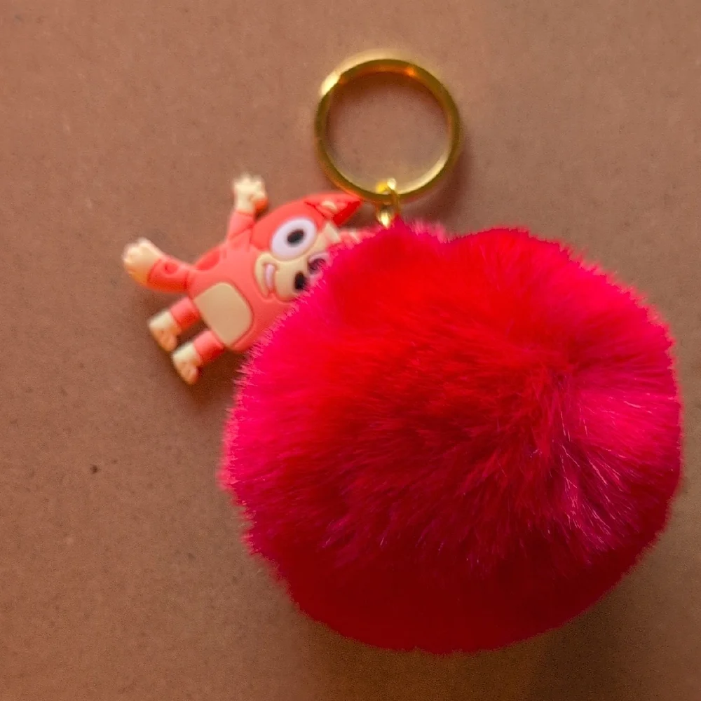 Vibrant Red Fluffy Keychain with Cartoon Charm